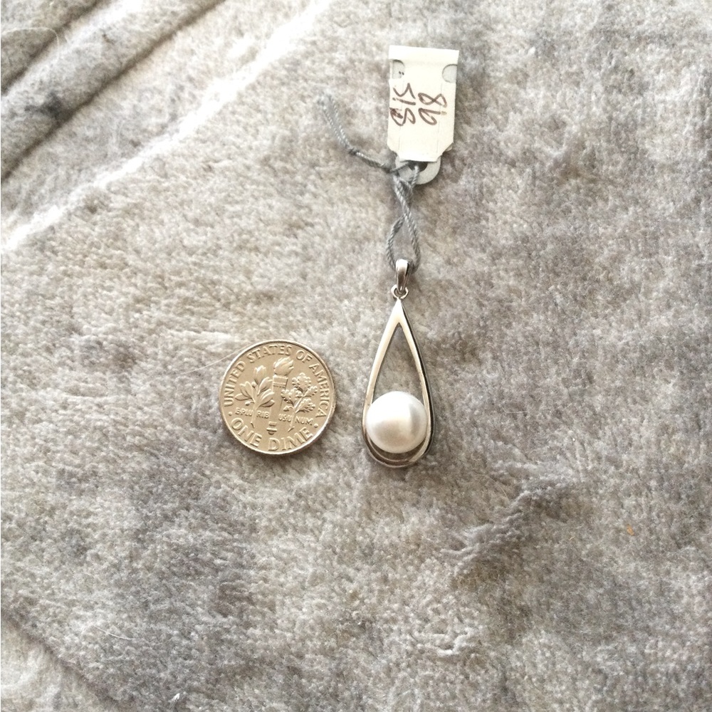 925 Sterling silvers with Fresh water white pearl charm.